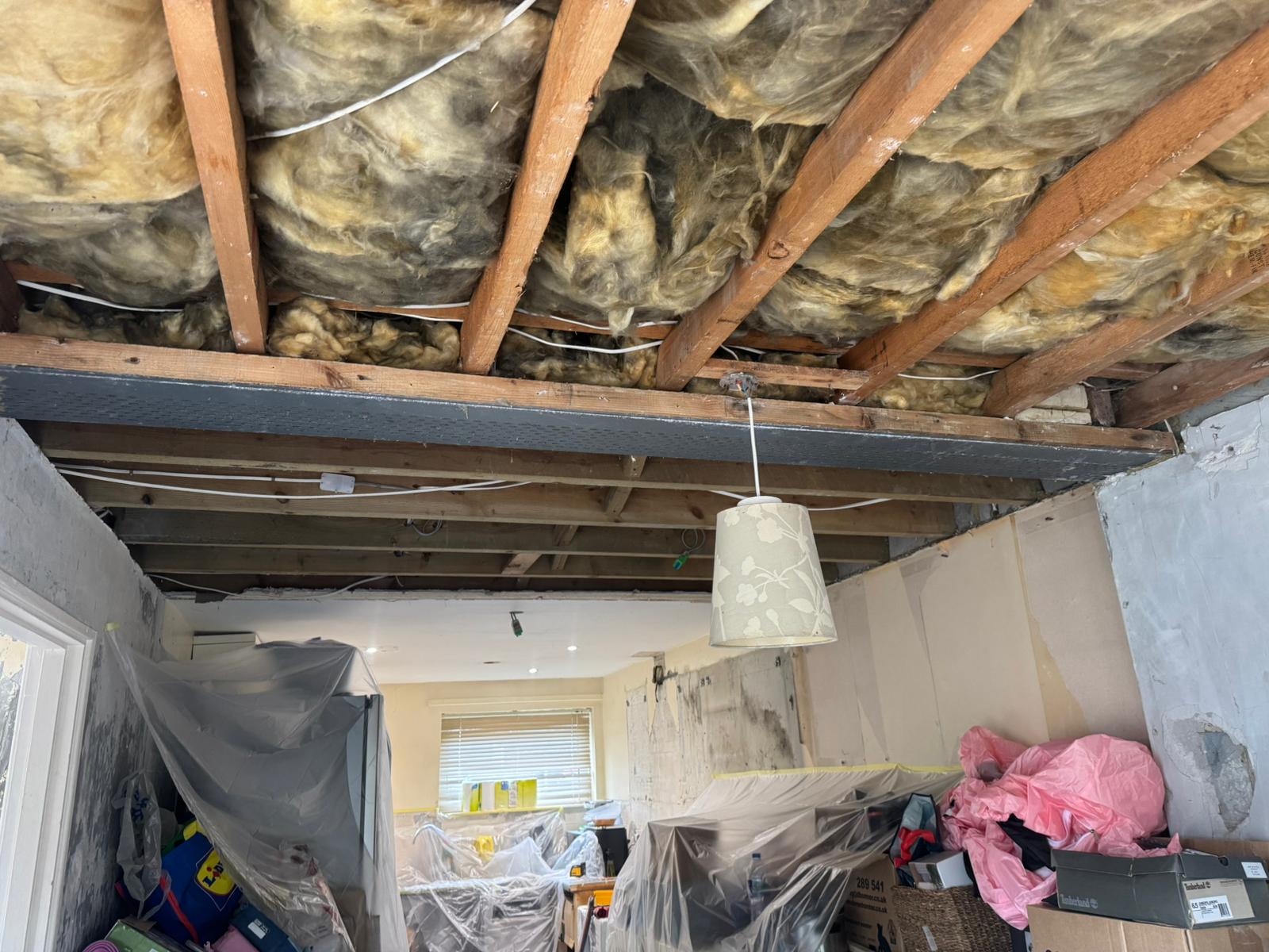 Ceiling opened for rewiring work by Nash Electrical Solutions